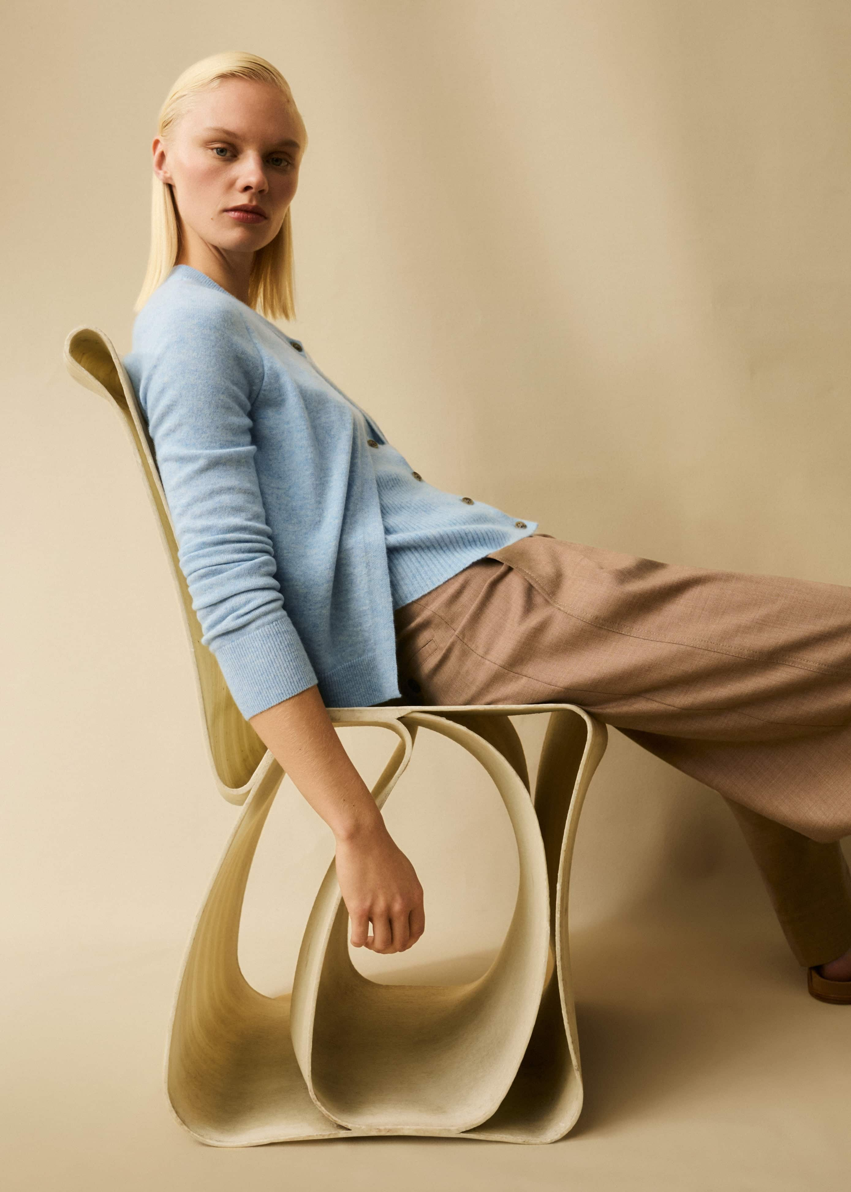 The vest underlayer is attached to the cardigan for the effortless ease of a one-piece.