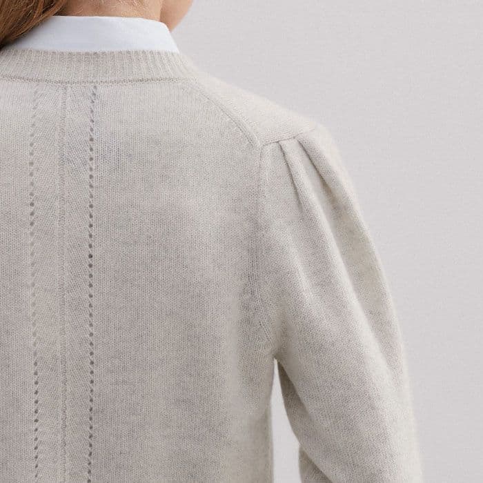 Creating the illusion of a narrower shoulder, the pouf at the top of the sleeves is positioned slightly further in towards the neckline.