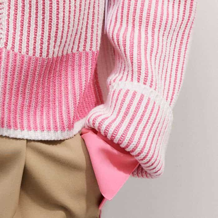 The deep cuffs can be turned back to shorten the sleeve length.