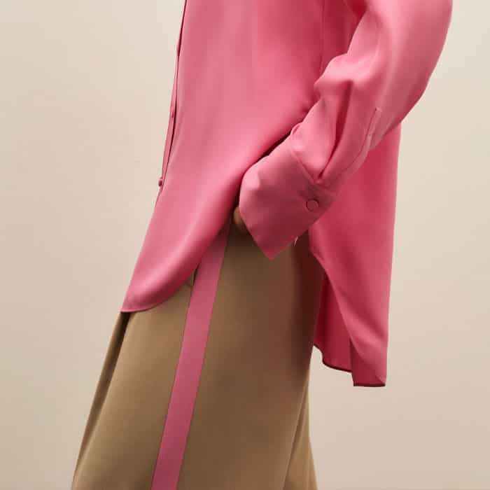 The contrasting pink side stripe can be colour-matched to tops and jackets for a cohesive finish.