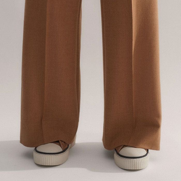 This trouser style comes in both a short and regular length, designed to accommodate different heights.