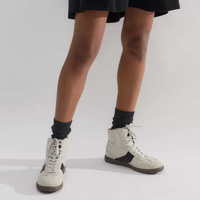 For an off-duty finish, sign off your look with our Retro High Top Trainer.