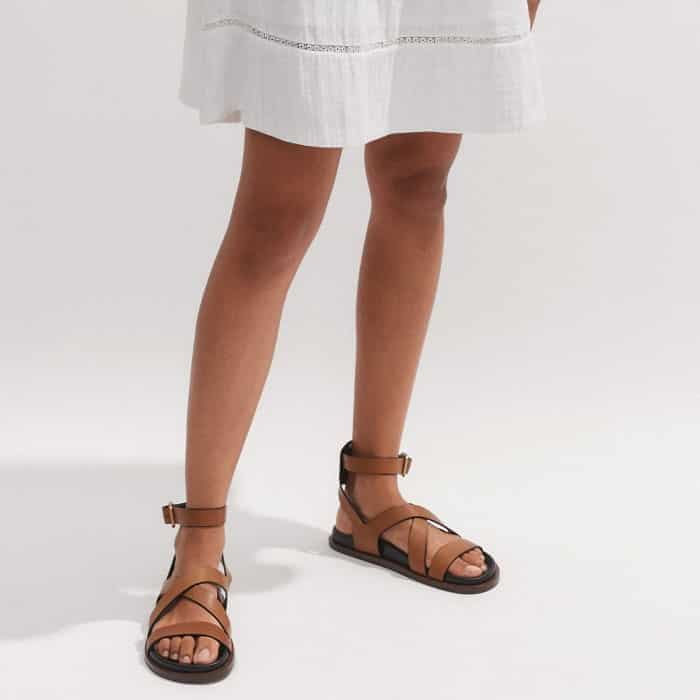 Our Crossover Footbed Sandal complements the shorter length of the dress.