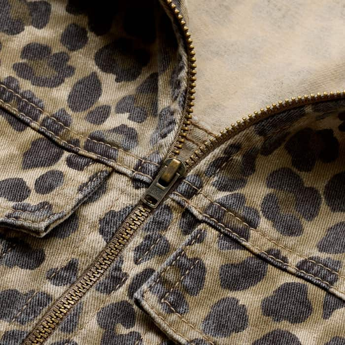 Crafted from cotton twill that's garment washed to give the leopard print a faded effect.