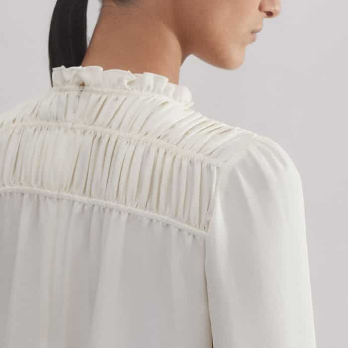 Creating the illusion of a narrower shoulder, the pouf at the top of the sleeves is positioned slightly further in towards the neckline.