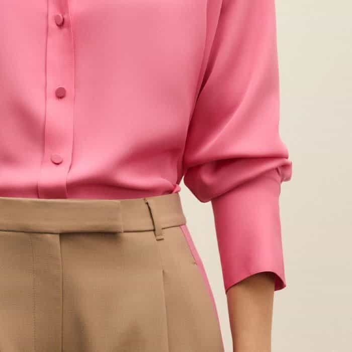 A button at the cuff allows you to turn back the sleeves for a more relaxed finish.