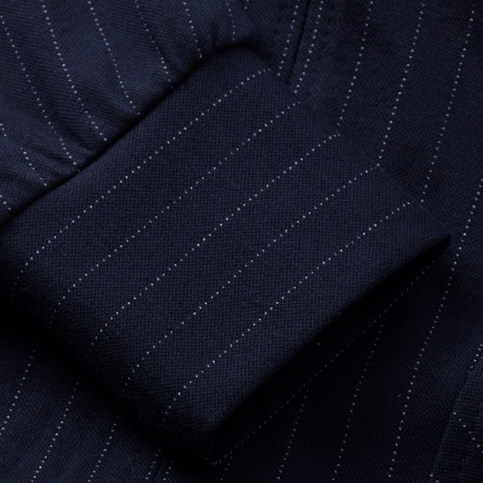 Crafted from smart midweight clean ponte tailoring with a pinstripe design, this fabric offers all the comfort of a jersey-stretch fabric.