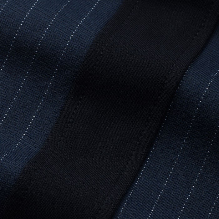 Crafted from smart midweight clean ponte tailoring with a pinstripe design, this fabric offers all the comfort of a jersey-stretch fabric.