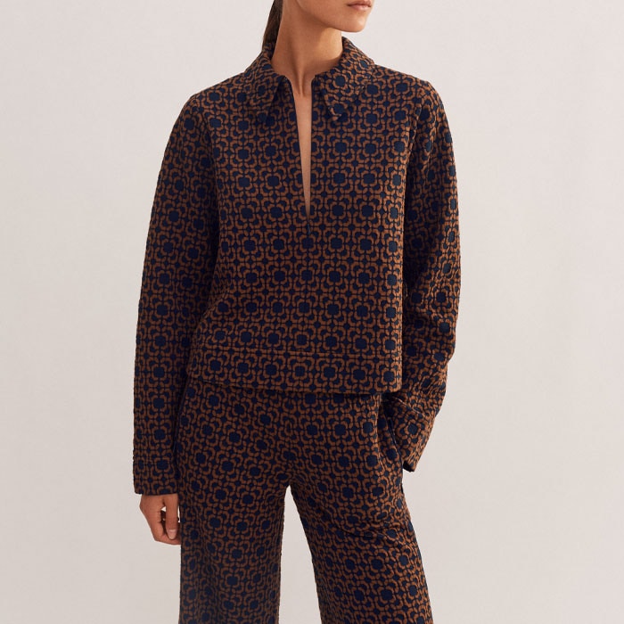 For a coordinated finish, pair it with the matching Travel Tailoring Graphic Jacquard Trouser.