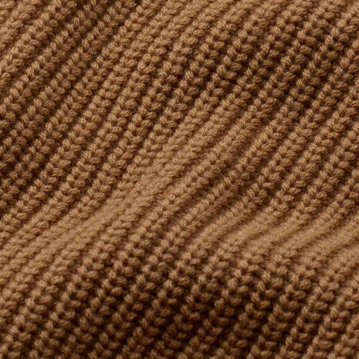 Blend of Italian merino wool and cashmere yarn, knitted in a chunky ribbed stitch on mid-heavy weight 5gg.