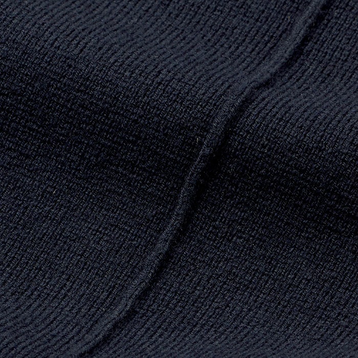 A blend of responsibly sourced merino wool with organic cotton, knitted in a clean, structured Milano stitch. Good stretch and recovery. All our wool is non-mulesed.