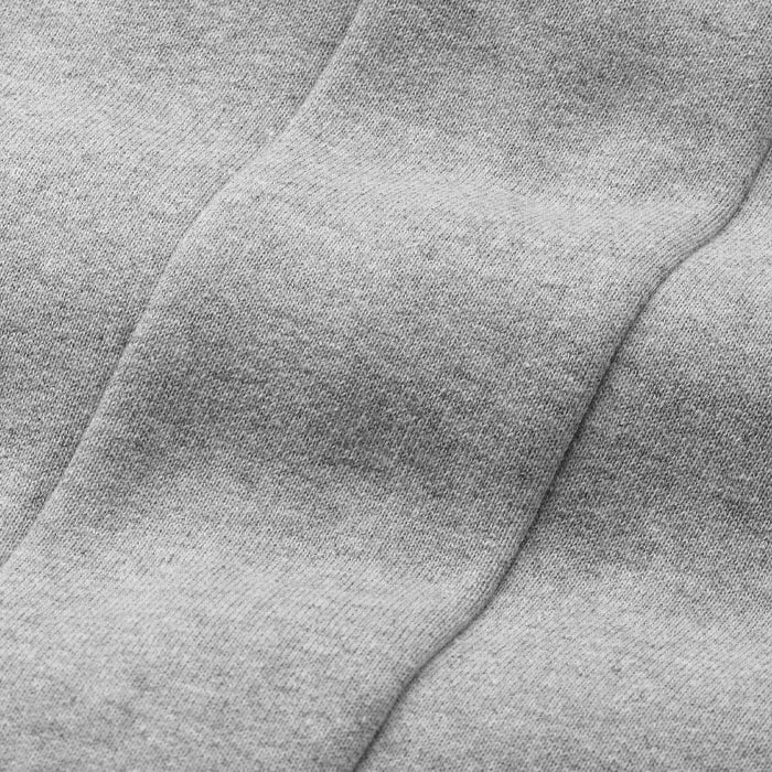 Crafted from heavyweight fleeceback sweatshirting in organic cotton, recycled cotton and recycled polyester. This fabric has good shape retention and a soft hand feel, offering all the comfort of a jersey-stretch fabric.