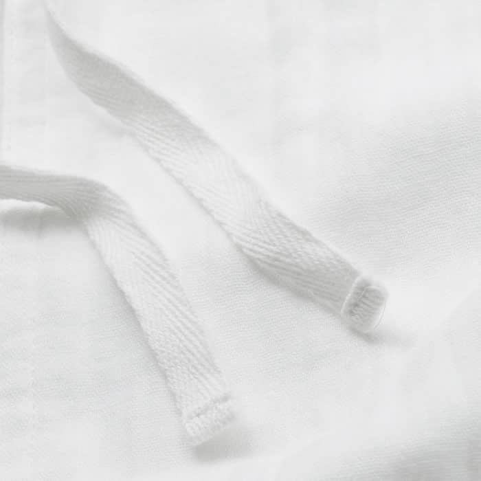 Lightweight and breathable, this double-gauze cotton cheesecloth fabric has a naturally textured surface for an iron-free finish.