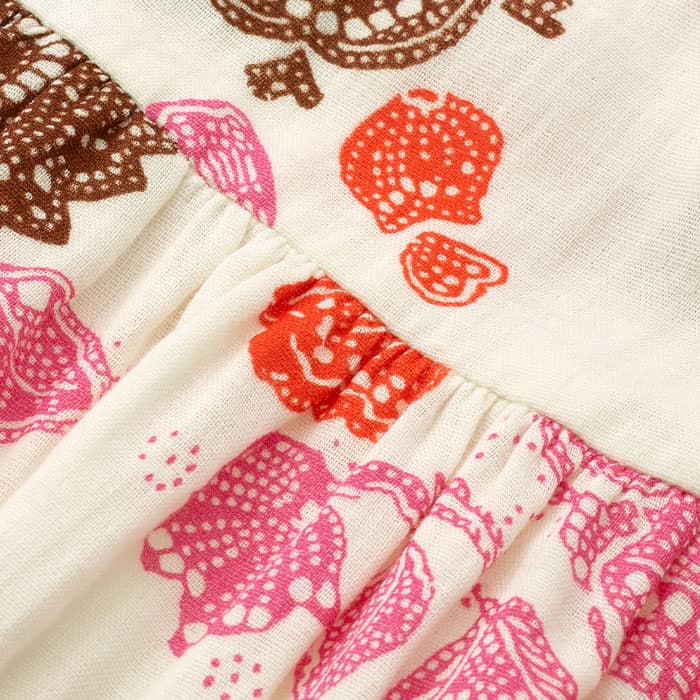 Double gauze cotton, this cheesecloth fabric features a simple texture that adds depth to your warm-weather wardrobe. 100% breathable, this fabric is lightweight and printed with a bespoke Bali print.