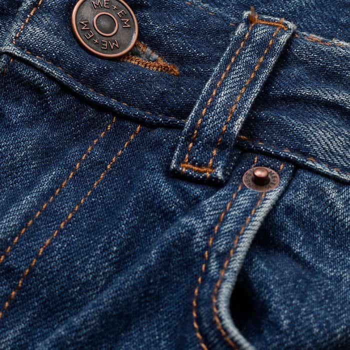 Crafted from Italian cotton denim in a dark wash.