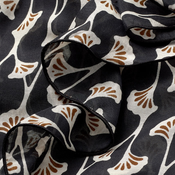 This lightweight and breathable blend of silk and cotton has a slight sheen and semi-sheer finish. Covered in our bespoke Ginko Leaf print, this versatile AM-PM solution will be a forever staple in your wardrobe.