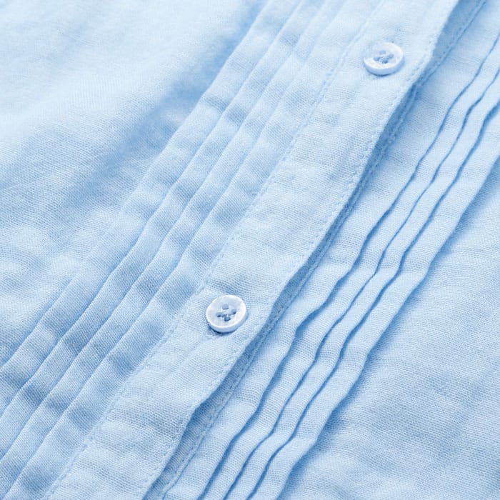 Lightweight and breathable, this double-gauze cotton cheesecloth fabric has a naturally textured surface for an iron-free finish.