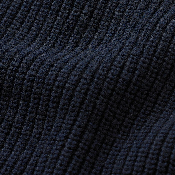 Cotton blended with responsibly sourced merino wool knitted in a chunky cardigan rib stitch, mid-heavy weight on 5gg.