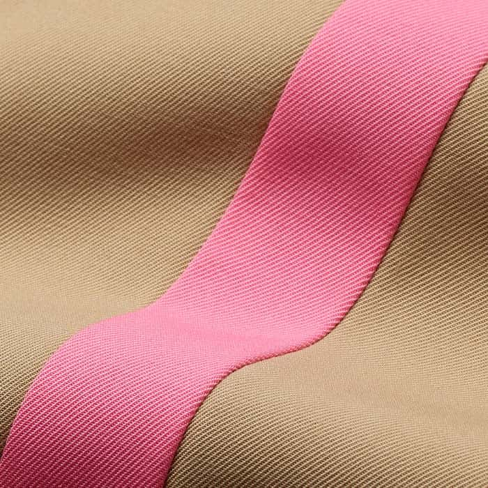 Made from Italian wool-blend tailoring fabric that has a fluid quality and pink side stripes.