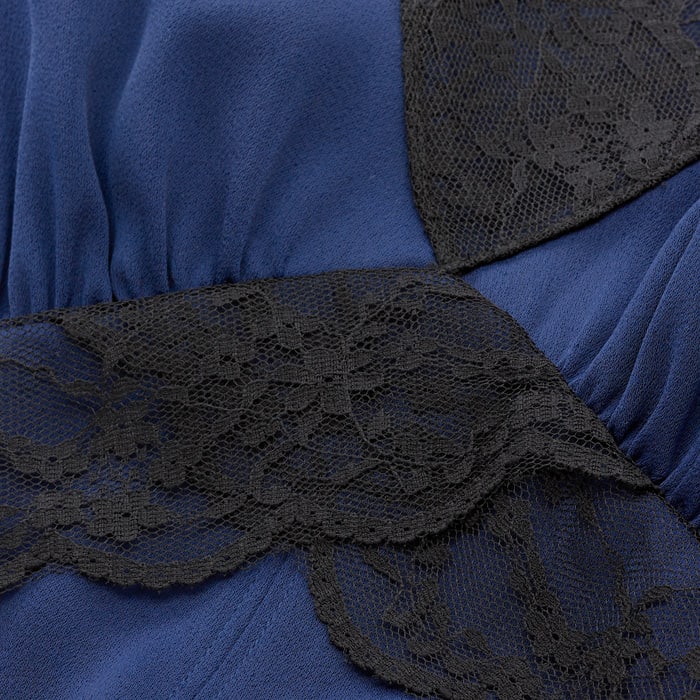 This sustainable, supersoft fabric is made from 100% recycled fibres. It features a combination of classic black lace and rich French navy satin and uses the shiny side of the fabric for a luxe finish. Easily styled with either black or navy.