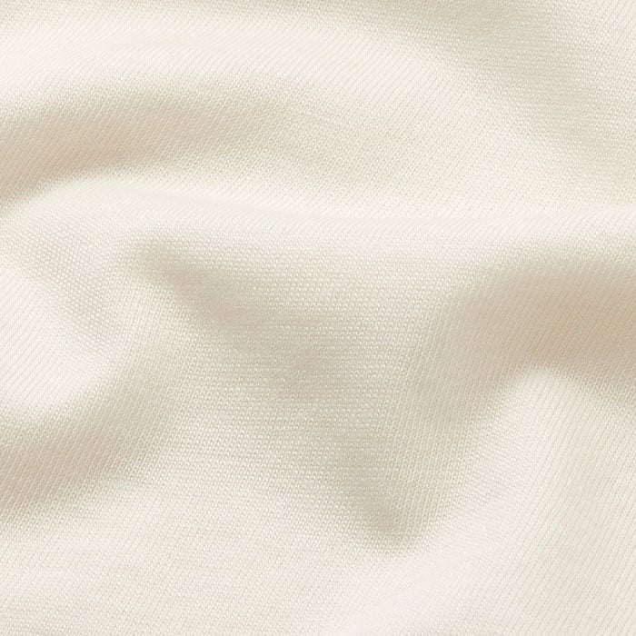 This is crafted from soft and clean jersey with a contrast sheer sateen woven.