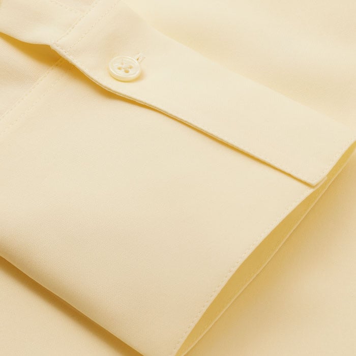 Crafted with luxurious midweighted silk, this fabric is drapey and breathable next to skin.