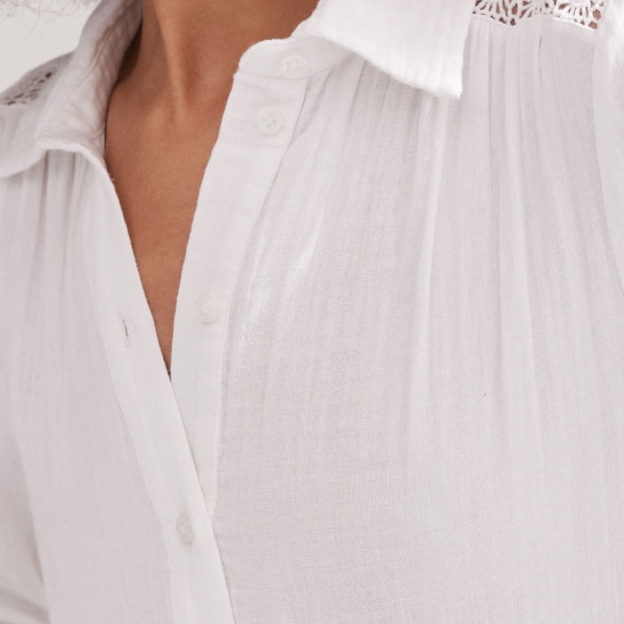 To accommodate different bust sizes, the button-down front can be adjusted.