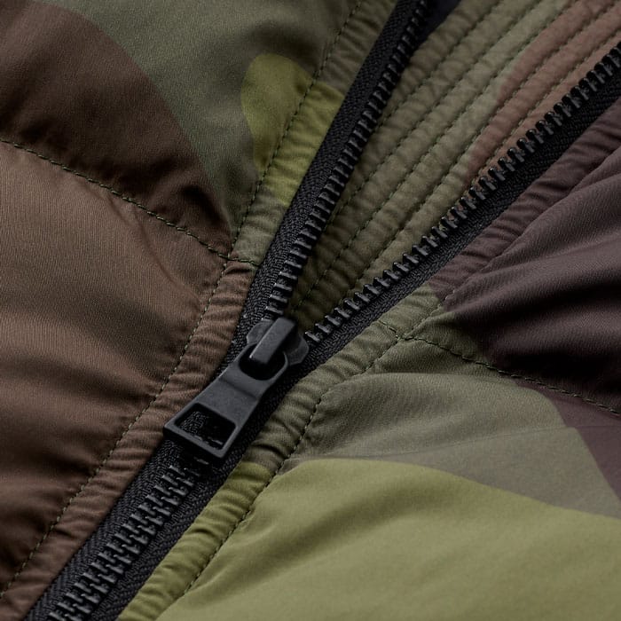 The technical outer fabric of this jacket is treated for a water-repellent finish. It's padded with a blend of down and feathers for maximum insulation.