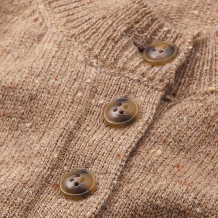 The premium yarn used to create this vest was spun in Donegal, Ireland using only the best quality wools. It has a soft handle with large subtly coloured flecks achieved through the traditional woollen spun method. This heritage yarn has a slightly drier 