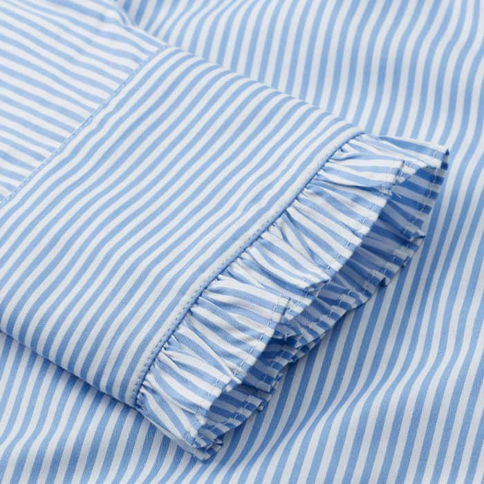 Crafted from cotton and Lyocell-blend shirting. The addition of Lyocell gives this fabric an ultra-soft feel. 