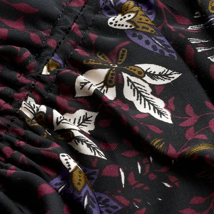 Crafted from luxurious high-shine satin featuring our Winter Wild Meadow print with black and purple colours. This breathable fabric feels like wearing silk but has easy-care benefits.