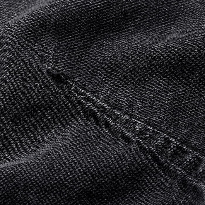 Crafted from washed black cotton denim. 