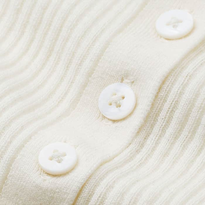 Superfine and lightweight merino wool and cashmere blend knit. 