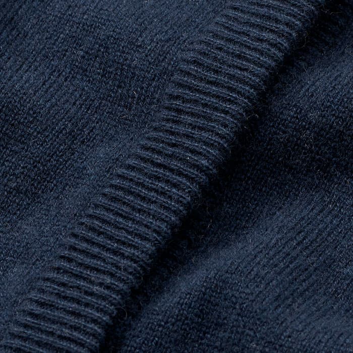 This is crafted from 12gg cashmere in intense blue and is lightweight with a supersoft handfeel. If any light pilling occurs, use our cashmere comb to restore.