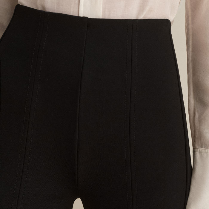 Seam detailing creates subtle structure through the legs.