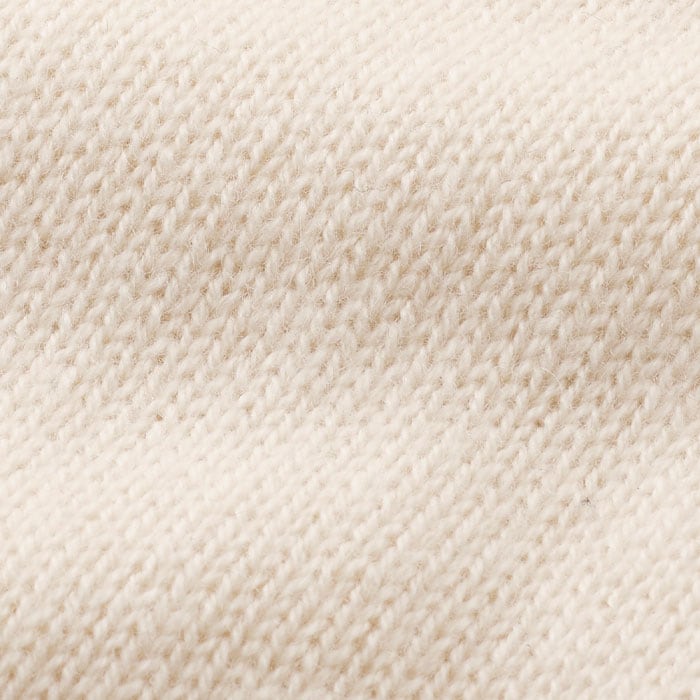 Responsibly sourced merino wool blended with 10% supersoft cashmere, knitted on 5gg with lofty tension.
Luxuriously soft hand feel. Natural, breathable yarn.