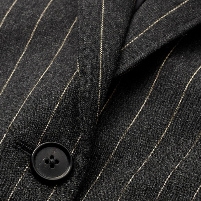 Made from Italian wool-blend tailoring fabric with a subtly brushed surface and camel-hued pinstripes.