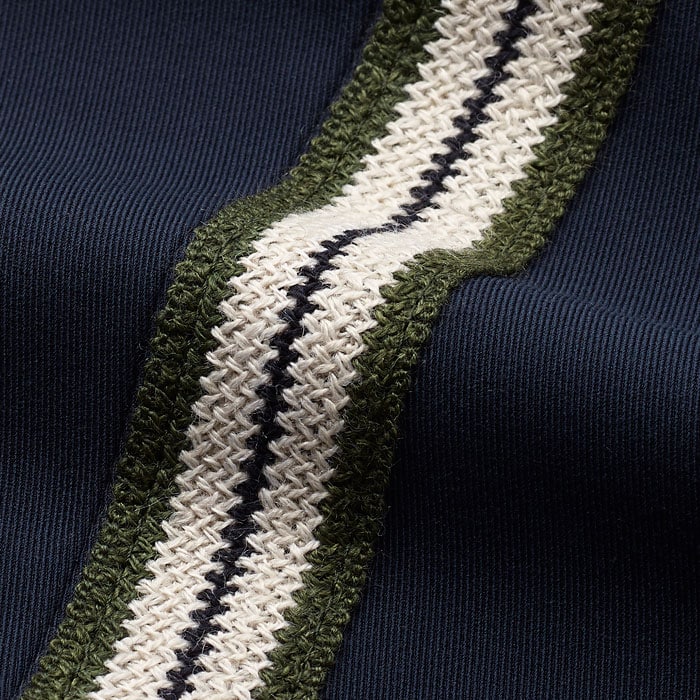 Italian fluid recycled fabric, with an Italian knitted signature side stripe tape.