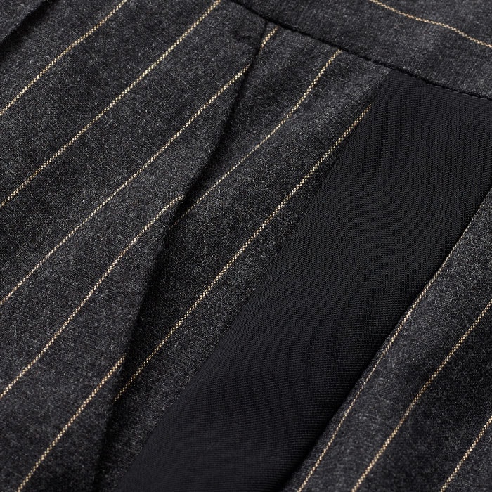 Made from an Italian wool blend fabric in a pinstripe pattern.