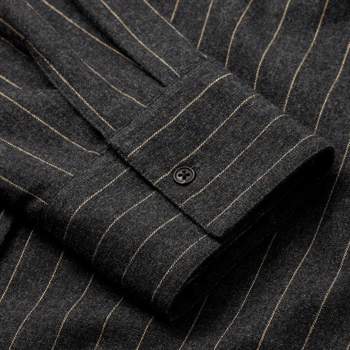 Made from Italian wool-blend tailoring fabric with a subtly brushed surface and camel-hued pinstripes.